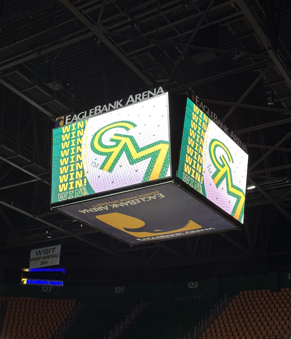 A scoreboard in the Eaglebank Arena with the words 'GM Win'.